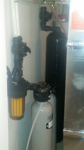 Kinetico chloramine reduction system (tall black in the back) and water softener (in the front)
