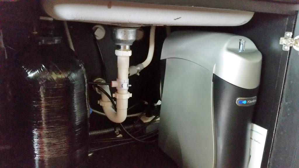 A Kinetico RO drinking water system installed under the sink in Bettendorf, Iowa