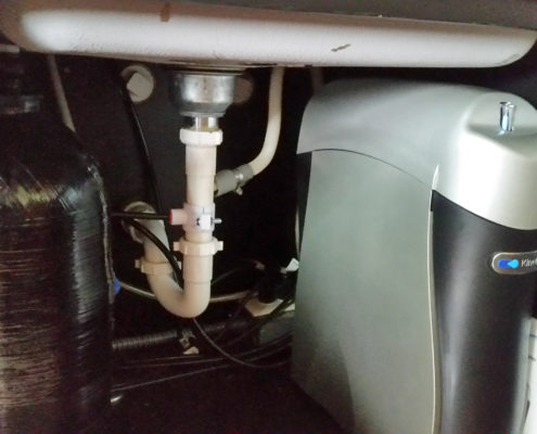 A Kinetico RO drinking water system installed under the sink in Bettendorf, Iowa