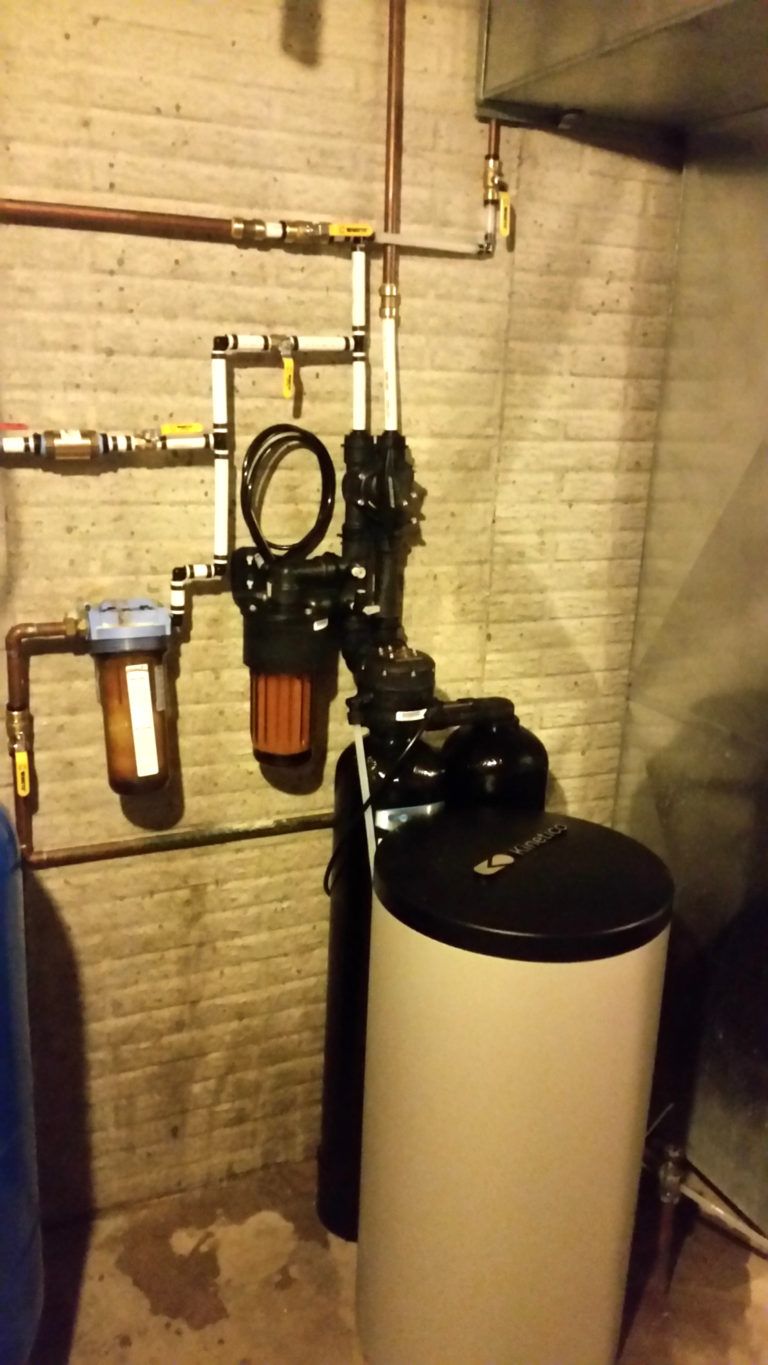 QC Soft Water installes a Kinetico water softener in Muscatine, Iowa