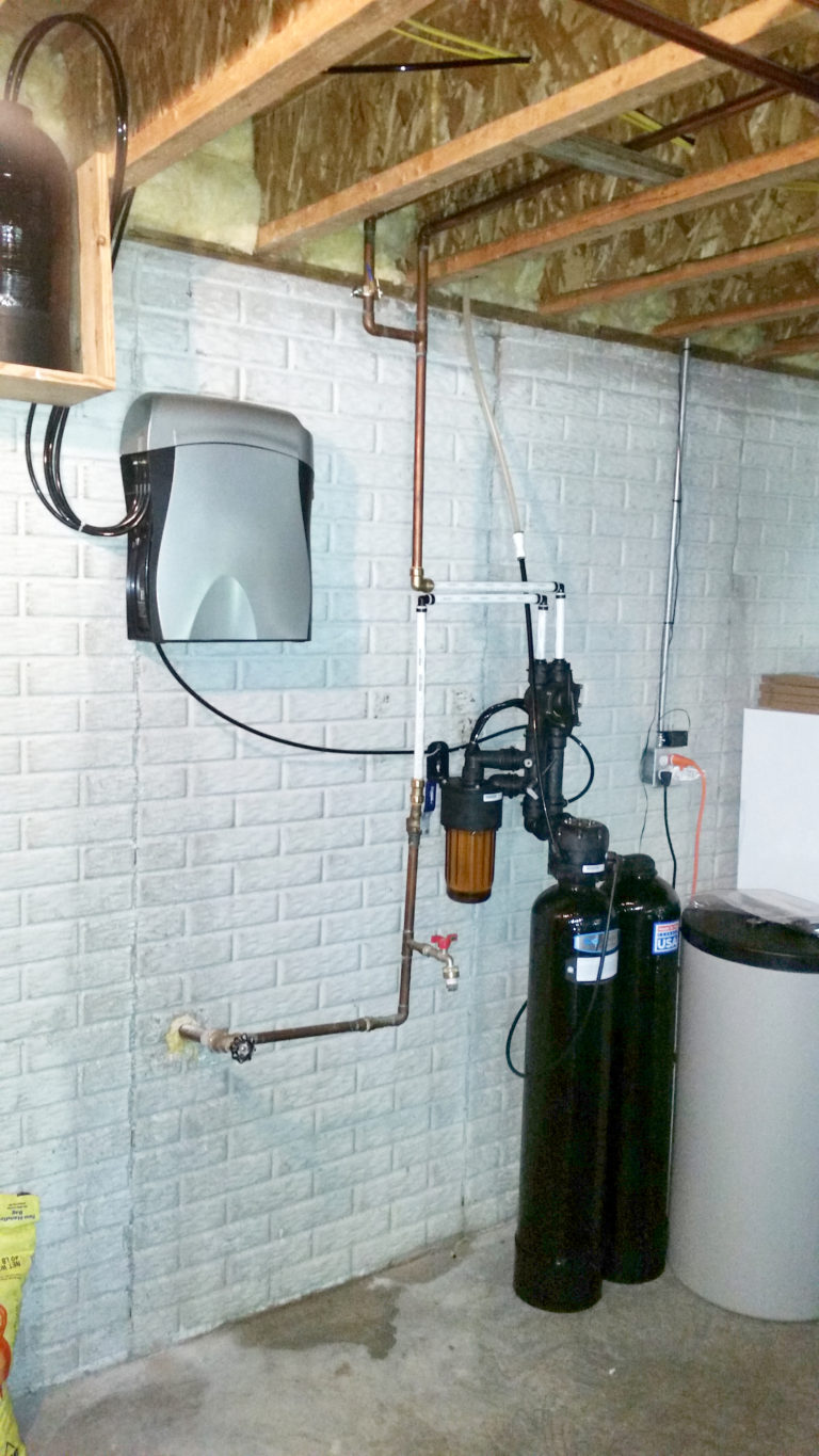 Kinetico softener & drinking water system installed and 1-year-old off-brand removed in Milan, Illinois